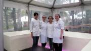 Chang and employees pose with the finished product.