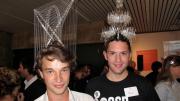 Two more Design School students show off their entries in the headdress competiton. The grand prize was an iPad 2.