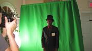 A student poses in the Dudley House photobooth.