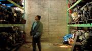 Joe, a quintessential New Yorker and central figure in <i>Foreign Parts,</i> takes a walking tour of a warehouse stocked with automobile parts.