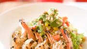Grilled shrimp adds color to The Omega, a salad with avocado, corn, and cilantro.