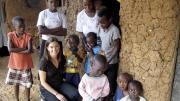 Betancourt with graduates of a FXB International program in Rwanda that has helped families reach economic self-sufficiency by starting businesses.