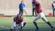 Junior Andrew Flesher, substituting for injured place-kicker David Mothander, made good on two field goals in the game’s overtime sessions. Holder Michael Pruneau’s deft handling of a low snap enabled Flesher to get off the first of his kicks.  