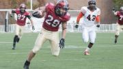 Halfback Paul Stanton Jr. (29) led the rushing attack against Princeton, carrying 12 times for 91 yards and two touchdowns. His first score came on a 60-yard breakaway that helped Harvard to a 14-13 lead in the game’s second quarter. The pursuing Tiger is linebacker Jason Ray.