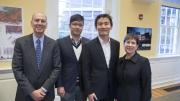 Kenneth L. Wallach and Susan S. Wallach with GSD students Keojin Jin (left) and Juhun Lee, who created <i>Saturate the Moment,</i> the inaugural installation for the garden now named for the Wallachs