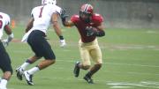 One on one: Harvard wide receiver Andrew Fischer ’16 proved ultra-elusive to his opposite number, Jared Roberts. Fischer had 237 all-purpose yards and his 78-yard second-quarter touchdown reception is the eighth longest scoring pass in Crimson history.
