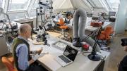 Straus Center for Conservation and Technical Studies director Henry Lie ’76 at work on a replica of a bronze in the collection.