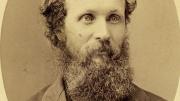 A formal portrait of Muir circa 1875