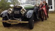 Robert Norton Ganz Jr. and his wife, Anne, give pride of place to his 1925 Lincoln convertible.