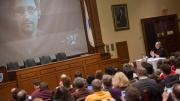 The scene in Ames Courtroom as Lawrence Lessig spoke with Edward Snowden