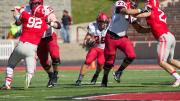 Picking his hole between the blocks of Cole Toner (78) and Larry Allen Jr. (73), Paul Stanton Jr. glided for a batch of his game-high 101 yards.