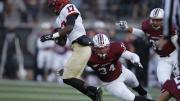 On kick runbacks and pass receptions, freshman Justice Shelton-Mosley had Leopard defenders such as Andrew Chuma (34) tackling nothing but air. 
