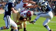 The Murphy effect: Having eschewed an easy field goal, Harvard placekicker David Mothander (37) carried out the fake called by his coach and crashed over the goal line for a momentum-building touchdown against Yale in 2011.