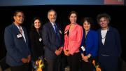 A group photo of six participants in the joint Harvard-University of Michigan summit on opioids