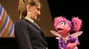  Muppet Abby Cadabby sings with a member of Hasty Pudding Theatricals.