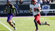 Harvard senior Cody Chrest runs with ball in hand
