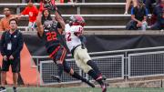 Princeton wide receiver Dylan Classi outstretches for a catch over Harvard defensive back Isaiah Wingfield.