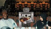 Guests at an elegant Nigerian dinner party are served by a boxy metallic robot. 
