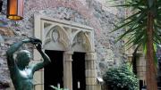 Castle courtyard with statue and stone work 