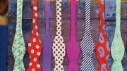 A display rack holding colorful men’s bow ties