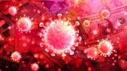 Scientific illustration of the SARS 2 virus over a backdrop of world currencies