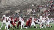 The Harvard offensive line battles with the Lafayette defensive line.