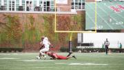 Two Harvard defenders pursue a Lafayette wide receiver.