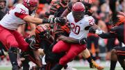 Aarom Shampklin tackled by Princeton defenders