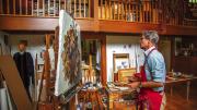 Jason Bouldin at work on a painting in his studio