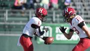 Harvard receivers Kym Wimberly and Ledger Hatch hold a choreographed end-zone celebration after Wimberly's second-quarter run for a score. 