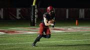 Jack Bill of Harvard in action; he had a 30-yard kick return and two pass catches for 20 yards.