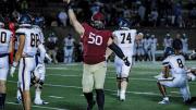Defensive lineman Thor Griffith, a junior, celebrating  two sacks and a game-high nine tackles against Merrimack