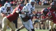Photograph by Meredith Keffer Linebacker Alex Gedeon ’12, who will captain the 2011 squad, was credited with seven solo tackles and 10 assists against Yale. Above: with Collin Zych closing in, Gedeon (49) stops halfback Cargill after a first-half gain of four yards.