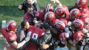 Photograph by Meredith Keffer Tackle Josué Ortiz ’12 got a hero’s welcome on the Harvard sideline after blocking a Yale punt in the third period. His big defensive play set up a rushing touchdown by Gino Gordon that gave Harvard a 21-14 lead.