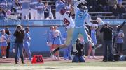 Receiver Chris Lorditch outjumped Columbia cornerback Brian DeVeau to snare a pass from quarterback Collier Winters in the third period of Saturday's game at Wien Stadium. Dodging two more Lion defenders, Lorditch dove into the end zone for a 41-yard touchdown, Harvard's fourth of the afternoon.