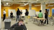 Users arrange themselves in the lab's flexible workspaces.