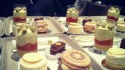 The four desserts—a lemon cake, a macaron, yuzu wasabi gelée with fresh grapefruit confit and mascarpone cream, and a milk-chocolate-and-hazelnut treat