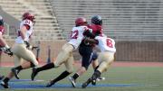 Linebacker Jacob Lindsey (51) trails the play as safety Reynaldo Kirton (22) and cornerback Brian Owusu (6) bring down Penn quarterback Billy Ragone. Ragone rushed for 95 yards and a touchdown, passing for two more Quaker scores in a 30-21 upset.