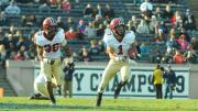 Safety Chris Splinter’s 33-yard return of a fourth-period pass interception set up Harvard’s final score of the game, a 48-yard field goal by kicker David Mothander. Trailing Splinter is cornerback D.J. Monroe.