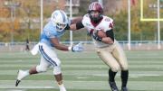 As the Columbia game wound down, tight end Ben Braunecker (48) caught a 13-yard pass from senior quarterback Michael Pruneau to set up Harvard’s final touchdown of the day. The Lion defender is cornerback Malcolm Thaxton.
