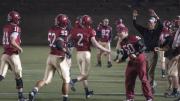 A welcoming committee greeted place-kicker Andrew Flesher after his game-winning field goal in the final minute of the Dartmouth game. Left to right: backup quarterback Michael Pruneau (11), the holder on the kick; team captain Josh Boyd (52); Flesher (2); injured tight end Cameron Brate (87); injured linebacker Connor Sheehan (50); and special teams coach Ryan Crawford.
