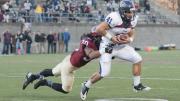 In the final minute of play, safety Jaron Wilson stopped Penn halfback Kyle Wilcox at the Harvard 20-yard line after a one-yard gain on a swing pass. Holding off three final passing attempts, the Crimson defense quashed the Quakers’ late bid for a game-tying rally.  