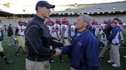 Hail and farewell: After the game, Harvard coach Tim Murphy (left) saluted Penn’s Al Bagnoli, who had just coached his final game at Franklin Field after 23 seasons and nine Ivy titles. His Quaker rival, said Murphy, “is the standard by which they’ll measure all Ivy coaches in this era.” 