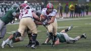 Assuming ground control on the game's opening drive, running back Paul Stanton Jr. '16 rumbled behind center Nick Easton ’15 (number 57) to a pair of touchdowns and a career-high 180 yards. 