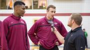 Team captain Evan Cummins '16 (shown during an interview at Crimson Madness) will play a key role leading the Crimson. Teammate Zena Edosomwan is at left.