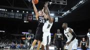Captain Evan Cummins ’16 dished out five assists against Providence, helping to implement head coach Tommy Amaker's "inside-out" offense.
