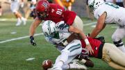 Harvard's Brogan McPartland dives for a loose ball.