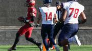 Harvard's Cody Chrest runs into the end zone.