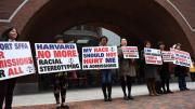 Photograph of demonstrators in front of the federal courthouse in Boston where the SFFA v. Harvard trial took place, with signs reading "Harvard No More Racial Stereotyping" and "My Race Should Not Hurt Me In Admissions.