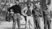 Monuments Men George Stout (at left) and Walter Hancock and Steven Kovalyak flank a fellow soldier in a May 1945 photograph.